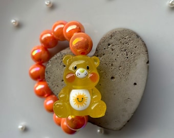 Handmade Perlen Armband mit leuchtendem Glücksbärchi