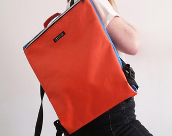 Upcycling bouncy castle backpack in red and blue