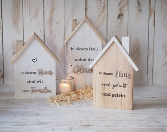 Haus Holzhaus mit Spruch