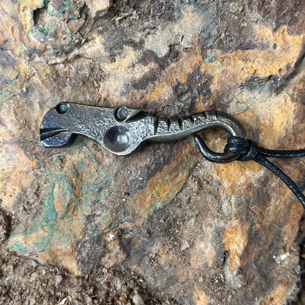 Hand forged horse head iron pendant