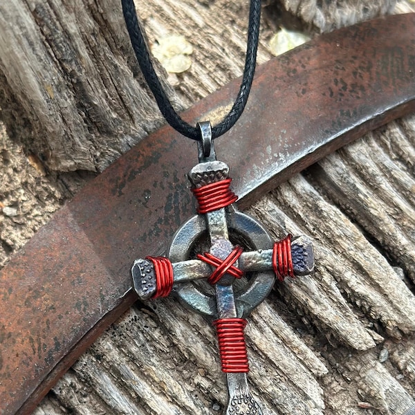 Forge Your Path with the Horseshoe Nail Celtic Cross Pendant