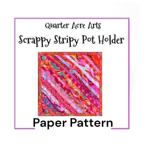 以下が含まれることがあります： カラフルなストライプの鍋つかみのペーパーパターン。パターンは、ピンク、オレンジ、白のストライプでカラフルなデザインになっています。