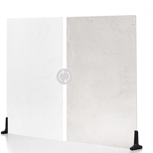 May include: Two white textured panels with black stands, connected by a circular arrow symbol. The panels have a rough, painted appearance, suggesting a decorative or artistic purpose. The panels are rectangular and stand upright.