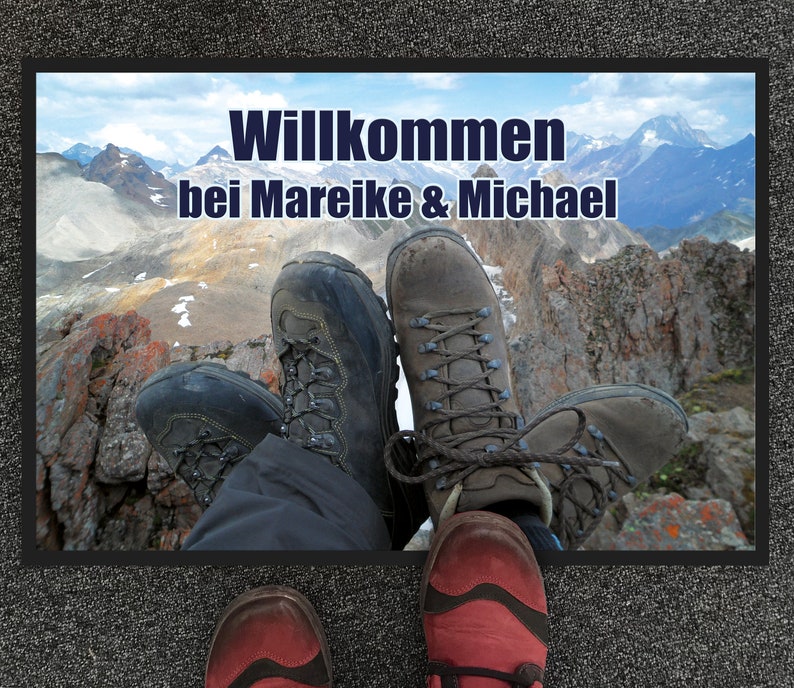 May include: A welcome mat with a mountain scene and the text "Willkommen bei Mareike & Michael".