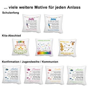 May include: A collection of eleven square white throw pillows featuring various printed designs for school, kindergarten, and religious milestones. Each pillow displays colourful text, names, and illustrations such as cones, flowers, bees, and fish.