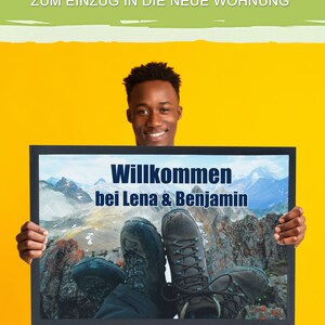 May include: A person holds a welcome mat with a mountain scene and the text "Willkommen bei Lena & Benjamin".