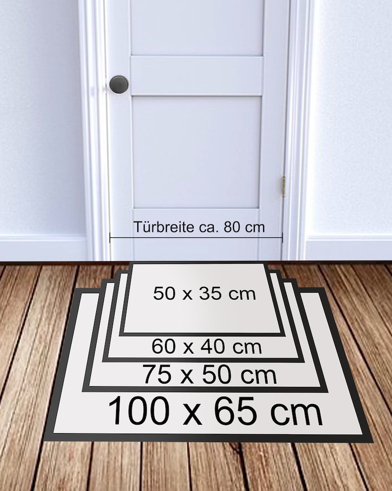May include: A white door with a black door knob. A black mat with white text showing different sizes in centimeters: 50 x 35 cm, 60 x 40 cm, 75 x 50 cm, 100 x 65 cm. The text "T&uuml;rbreite ca. 80 cm" is above the mat.