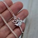 see more listings in the Silver Charm Necklace section