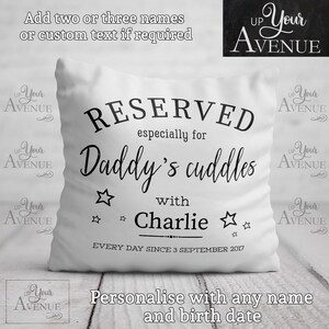 May include: White pillow with black text that reads "RESERVED especially for Daddy's cuddles with Charlie EVERY DAY SINCE 3 SEPTEMBER 2017". The pillow has a black star design.