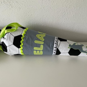 Cartable en tissu football fumé bleu néon jaune