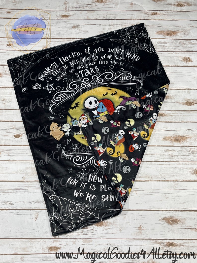 May include: Black blanket featuring characters from The Nightmare Before Christmas. The design includes Jack Skellington, Sally, and other characters against a moonlit background. Text includes "My dearest friend..." and "Now for it is plain we're simply meant to be."