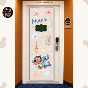 May include: A rectangular door cover featuring a light beige background with the text Ohana, a pink camera, hibiscus flowers, a surfboard, a ukulele, a tiki mask, a rainbow, a coconut drink, a starfish, a seashell, and two cartoon characters.