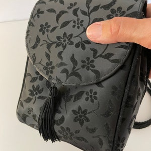 Abendtäschchen/Clutch Schwarz Floral