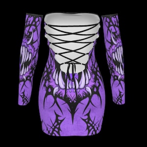 May include: A purple off-the-shoulder dress with long sleeves. The dress features a white corset-style back with black lacing. The design includes a graphic of a monster's teeth and claws in black and white.