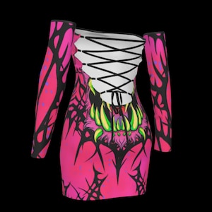May include: A vibrant pink off-the-shoulder dress with long sleeves. The dress features a black and pink pattern on the sleeves and a graphic monster design on the front. The back has a white lace-up detail.