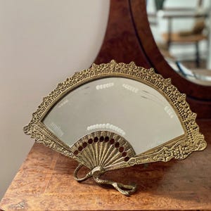 Vintage vanity fan mirror in bronze with engraved glass, French bedroom decor