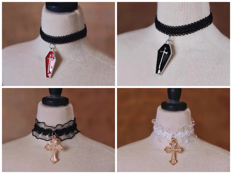 May include: Four different black and white chokers with pendants. The pendants are a red coffin with a cross, a black coffin with a cross, a gold cross, and a gold cross with rhinestones.