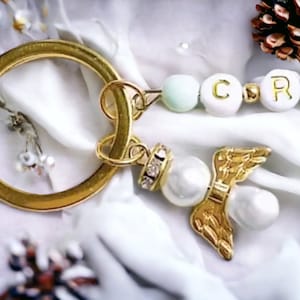 Schutzengel Gold | Glücksbringer | Taufe | Schlüsselanhänger mit Name in Geschenkbox mit Wunschtext.