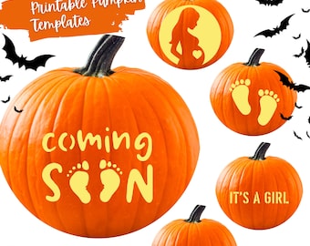 May include: Orange pumpkins with black stems, decorated with baby-themed designs. The pumpkins feature text that says "BABY SHOWER", "coming soon", "IT'S A BOY", and "IT'S A GIRL". There are also bat silhouettes.