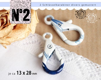 2 pretty key carabiners - the metal white lacquered with various blue random patterns - ø each about 13 x 28 mm - No. 180