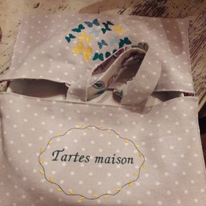 Vlinder geborduurde taartzak