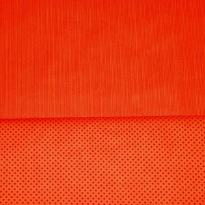 Könnte beinhalten: Zwei Stücke orangefarbener Stoff, eines mit vertikalen Streifen und das andere mit Punkten.