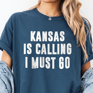 Kansas Is Calling I Must Go Shirt | Travel Tee for Moving To Kansas Lover, Adventurer | Gift for Travel Enthusiasts, Explorers, Nature