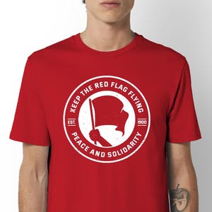 May include: A rustic wooden sign with the text "Welcome to our home" in white lettering. The sign features a distressed finish and a simple, inviting design, perfect for front door decor.