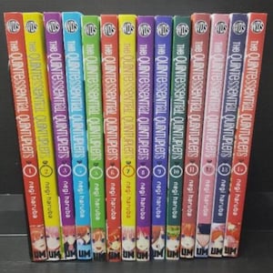 May include: A collection of fourteen manga volumes titled The Quintessential Quintuplets by Negi Haruba. Each book spine features a unique colour, including red, yellow, purple, blue, green, and pink, with volume numbers one through fourteen.