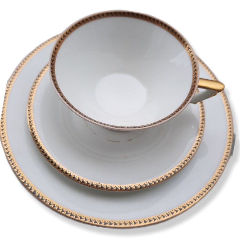 vintage collector's cup gold rim on white image 1