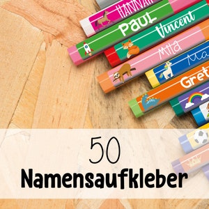 May include: A set of 50 colorful name stickers with various animal and object designs. The stickers feature names like Paul, Vincent, Greta, and Kim.