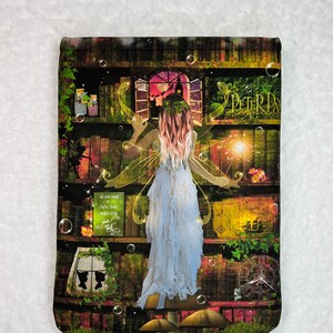 May include: A fairy with long pink hair and a blue dress stands in front of a bookshelf with a window behind her. The bookshelf is filled with books and there are fairy lights and bubbles around her. The text "Peter Pan" is visible on the bookshelf.