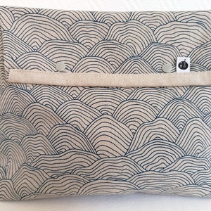 Large toiletry bag with waves in dark blue
