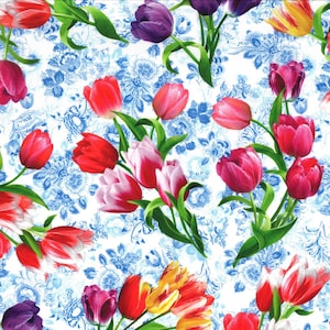 May include: A white background with a blue floral pattern.  The background is covered with colourful tulips in shades of red, pink, yellow, orange, and purple.