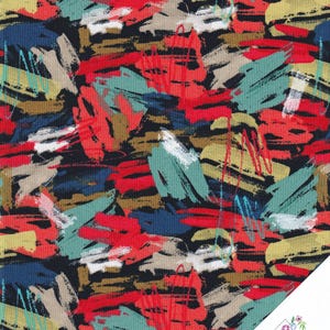 Peut inclure: Tissu abstrait avec un fond noir et des coups de pinceau colorés en rouge, bleu, sarcelle, beige et jaune. Le tissu présente un motif artistique, adapté au patchwork ou à d'autres projets créatifs. Le coin inférieur droit affiche le logo "Quilt Shop Ruth Baudisch".