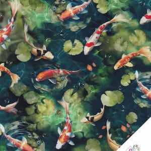 May include: A colourful fabric featuring a repeating pattern of koi fish swimming in a pond with lily pads and water ripples. The background is a deep teal blue with green and brown accents.