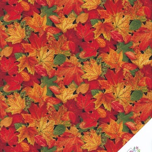 Puede incluir: Una impresión de tela con un patrón repetitivo de hojas de otoño coloridas en tonos de rojo, naranja, amarillo y verde. Las hojas están dispuestas en un patrón aleatorio sobre un fondo negro.