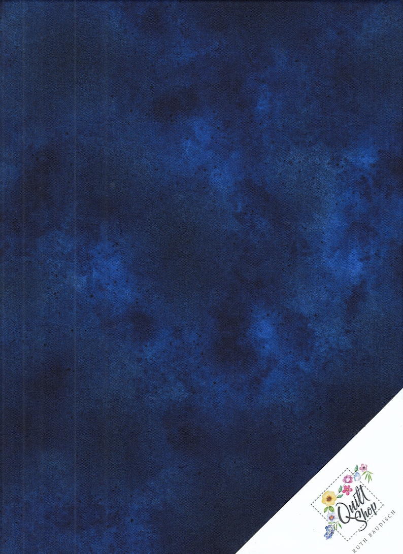 May include: A deep blue fabric with a subtle marbled pattern. The fabric has a soft, textured feel and is perfect for quilting or other craft projects.