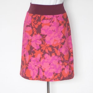 Jersey skirt A-line, cotton jersey large, abstract flowers pink/orange on aubergine, knee-length