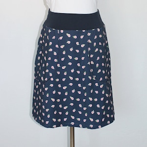 Skirt with pockets, A-line, cotton jersey roses on dark blue, knee-length