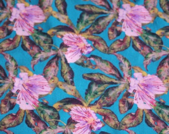 Ökotex cotton jersey digital print lilies pink on turquoise petrol by Stenzo