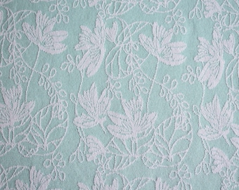 Jacquard-Strick hellmint mit Blumen & Ranken hellrosa, Strick-Jersey Rest 1.50Meter