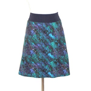 Jerseyrock A-Form Ökotex-Baumwolljersey blau/türkis/lila Aquarellmuster, knielang
