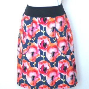 Jersey skirt A-line with pockets, cotton jersey large watercolor poppies orange/berry on dark blue, knee-length