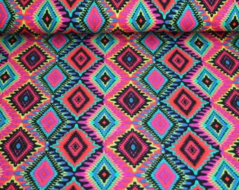 May include: Vibrant fabric with a repeating geometric pattern. The design features diamond shapes in shades of pink, red, blue, and black, creating a bold and colorful textile. The fabric is likely used for clothing or home decor.