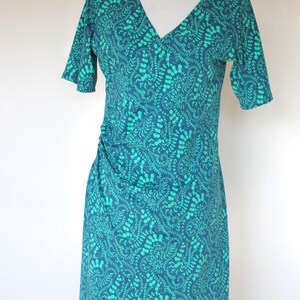 Shirt dress with 3/4 sleeves, cotton jersey, wrap look, turquoise/smoke blue fantasy pattern, knee-length
