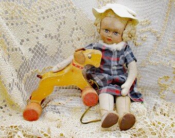 Vintage pretty expressive girl doll, rag doll from the 40s