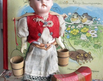 antique dollhouse doll, porcelain head, milk carrier with wooden cow