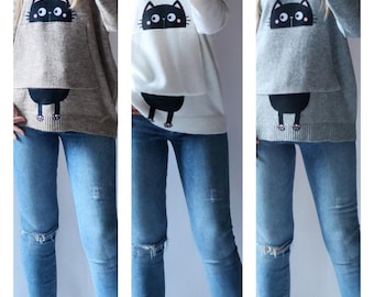 Oversize hoodie in three colors with an appliqué