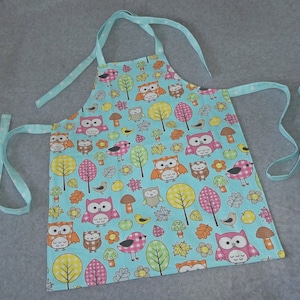 Children&#39;s apron reversible apron owls in the forest size 2 / 4-6 years - baking and cooking - turquoise colorful - stars